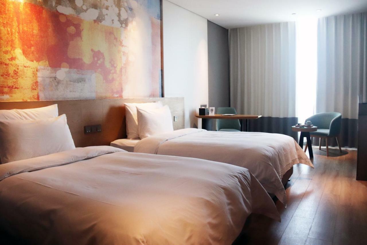 M Hotel Zhengzhou Exterior foto